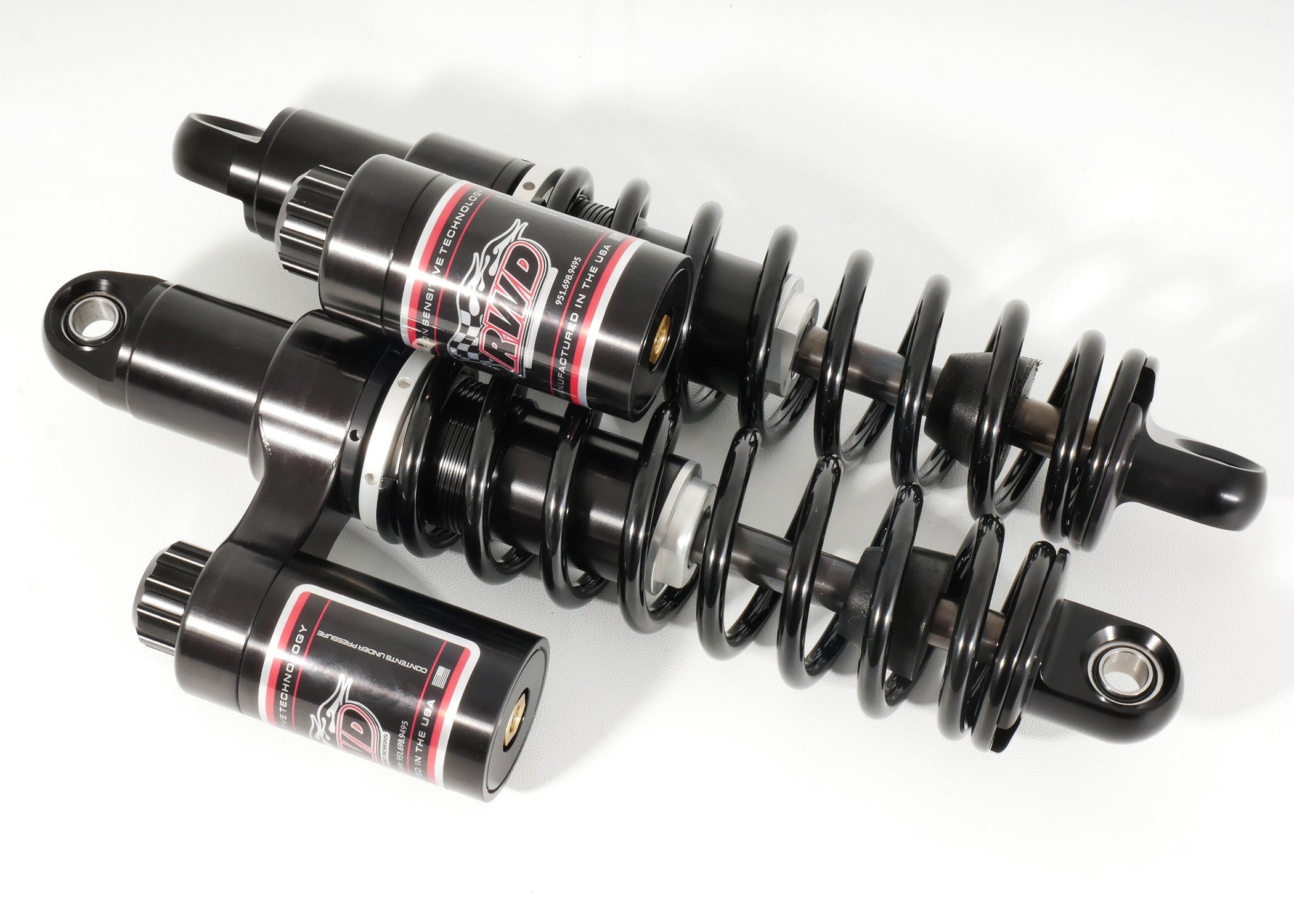 RWD V-Twin Harley suspension parts shown on a white background