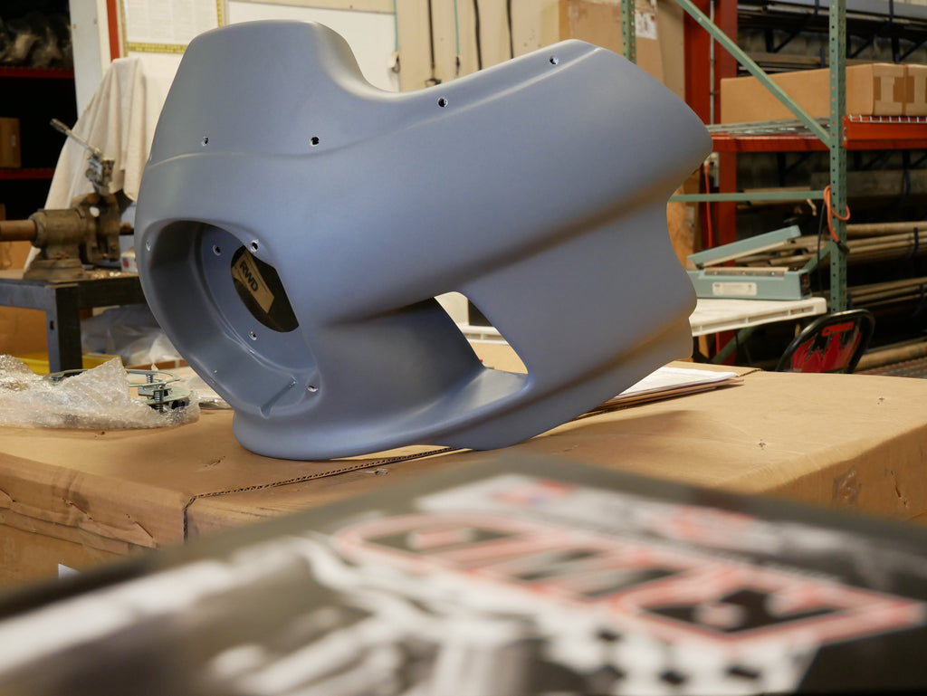 RWD V-Twin Harley part shown on a workbench